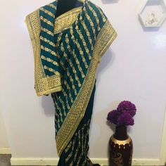 Green Color With Gold Embroidered Indian Party Wear Saree With Unstitched Blouse Fabric: Banglori Silk Traditional Pre-draped Saree For Festive Party, Semi-stitched Traditional Wear For Celebration, Saree With Intricate Embroidery For Navratri Party, Party Saree With Intricate Embroidery For Navratri, Blouse Piece With Intricate Embroidery For Celebration, Bollywood Style Embroidered Pre-draped Saree For Party, Elegant Saree With Intricate Embroidery For Celebration, Traditional Pre-draped Saree For Party, Traditional Silk Pre-draped Saree For Party