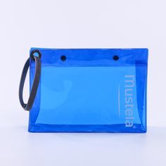 a blue water bag sitting on top of a white table next to a black strap