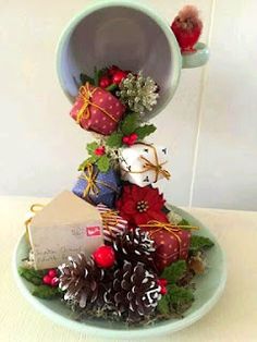 a bowl filled with lots of christmas decorations