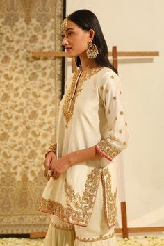 Ivory short silk chanderi kurta with gota patti, dabka, zardozi embroidery in floral pattern. Paired with a gharara with embroidered buttis and dupatta with all over floral jaal embroidery. - Aza Fashions Jaal Embroidery, Kurta Patterns, Zardozi Embroidery, Short Kurta, Women Kurta, Tarun Tahiliani, Straight Kurta, Silk Organza, Modern Bride