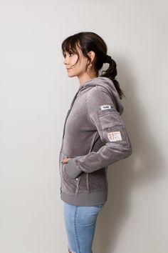 Our ladies' hoodie in a luxurious medium-weight Velour for the holidays. You can wear this super comfortable hoodie from the gym, on your errands, and straight into the holidays nights with this soft and cozy jacket. Equipped with front pockets, a sleeve pocket, and multiple inside pockets, there are plenty of options on this hoodie to store your phone on the move. Available in Black, Scarlett Red, and Smoke Silver Multiple “Phone Safe” inside pockets – we love options! Water repellent sleeve po French Terry Loungewear Hoodie, Sporty French Terry Sweats, Sporty Hooded French Terry Outerwear, Hooded French Terry Winter Outerwear, Winter Athleisure Hooded Jacket With Cozy Fit, Cozy Fit Winter Athleisure Hooded Jacket, Cozy Fit Athleisure Winter Hooded Jacket, Sporty Cozy Fit Hooded Jacket, Sporty Hooded Jacket With Ribbed Cuffs And Cozy Fit