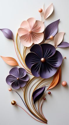 paper flowers are arranged on top of each other, with gold and purple leaves in the center