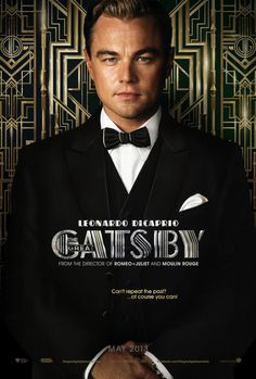 a cat wearing a tuxedo and bow tie in front of a poster for the great gatsby