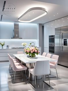 a modern kitchen with stainless steel appliances and white marble dining table surrounded by pink chairs