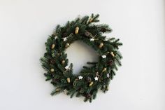 a christmas wreath hanging on the wall