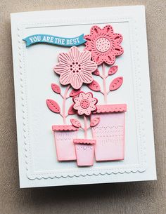 a card with some flowers in a pot on the side and a ribbon around it that says, you are the best