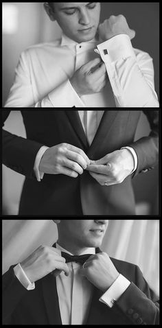 the man is adjusting his tie before he gets dressed for formal function in black and white