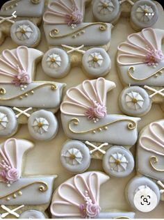 decorated cookies in the shape of baby carriages