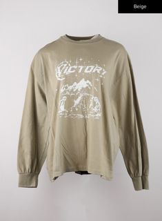 victory-graphic-lettering-oversized-tee-cd328 / Beige Oversized Graphic Print T-shirt For College, Grunge Style Text Print Tops For Fall, Trendy Drop Shoulder Tops With Logo Print, Trendy Drop Shoulder Top With Logo Print, Fall Season Logo Print Tops For Streetwear, Oversized Green Logo Print Tops, Urban Slogan Tops For Fall, Fall Streetwear Tops With Logo Print, Baggy Crew Neck Top With Letter Print