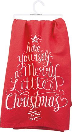 a red bag with white lettering on it and a star hanging from the front, says have yourself merry at the christmas tree