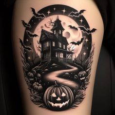 a black and white photo of a house with pumpkins in front of the moon