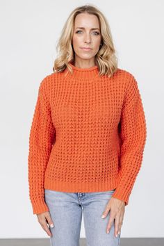 Baltic Born exclusive style Perfect cozy sweater for crisp days Lightweight waffle-knit sweater Rich apricot orange color Chunky raised sweater knit Wide-ribbed, rolled funnel neck Wide-ribbed cuff and hemline Trina is 5'6, cup size 32D, size 2 and is wearing size S Apricot Orange, Baltic Born, Waffle Knit Sweater, Chunky Knit Sweater, Cozy Chic, Cozy Sweater, Chunky Knits Sweater, Sweater Knit, Cup Size