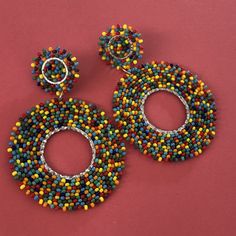 Seed Bead Earrings Colorful Hoop Earrings Tiny Bubbles Multicolored Post Stud Earrings by WorkofHeart on Etsy Multicolor Circular Beaded Jewelry, Multicolor Round Beaded Earrings For Festival, Multicolor Beaded Earrings For Festival, Multicolor Tiny Beads Hoop Earrings For Festival, Colorful Large Beaded Earrings, Multicolor Wooden Beaded Earrings As A Gift, Handmade Multicolor Vibrant Beaded Earrings, Handmade Vibrant Multicolor Beaded Earrings, Fun Multicolor Earrings With Colorful Beads