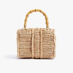 Timeless and posh, Pamela Munson’s straw accessories are beloved by island hoppers and city dwellers alike. Her bags reinterpret straw as a natural, sustainable material that can be worn any season, anywhere. Finally, a gold minaudière that goes with everything. This handwoven raffia handbag is expertly crafted and beautifully finished with brushed gold mini hardware, bamboo and rattan. Every detail is considered with special attention to function and versatility. Named after Pamela’s grandmothe Pamela Munson, Raffia Handbag, Straw Accessories, Brushed Gold Hardware, Mini Handbag, Bamboo Handles, Mini Handbags, Accessories Branding, Gold Hardware