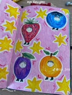 an open children's book with pictures of fruits and stars on it, in spanish