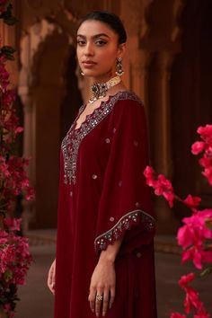 Magenta kaftan kurta with tribal embroidery using beads, cutdana. Paired with a pant with embroidered border. - Aza Fashions Magenta Velvet, Kaftan Kurta, Velvet Embroidery, Embroidery Beads, Pant For Women, Embroidered Border, Kurta With Pants, Fashion App, Aza Fashion