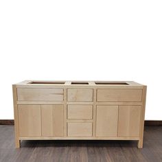 a large wooden cabinet sitting on top of a hard wood floor