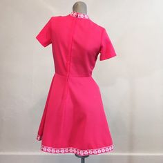 Shoulders 15 inches Bust 37 inches Waist 26 inches Length 34.5 inches Excellent condition. I had s hard time capturing the right pink. It's a pretty hot pink, but not electric neon. The fabric is a polyester crepe. High Waisted Circle Skirt, Pendleton Dress, Vintage Tuxedo, Pink Circle, Audrey Hepburn Style, Polka Dot Maxi Dresses, Hepburn Style, Yellow Polka Dot, Tuxedo Shirts