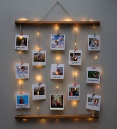 a wall hanging with pictures and lights on it