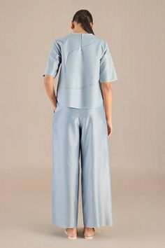 Powder blue half sleeves top with self design details. Paired with a front pleat detail pant with side pockets. - Aza Fashions Pant Women, Pant For Women, Half Sleeve Tops, Pant Sets, Sleeves Top, Self Design, Powder Blue, Aza Fashion, Half Sleeves