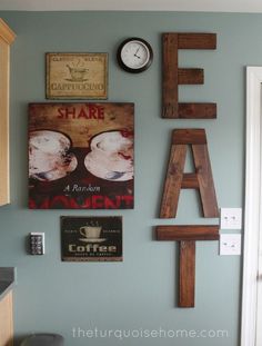 the wall is decorated with wooden letters and other items that spell out love, coffee