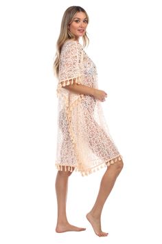 Lace Crochet Kaftan Cover Up Wholesale by La Moda. This cover up is made of lace, crochet trim and v-neck is the perfect accessory to highlight life's most precious moments. Holidays are made for relaxing by the pool, lounging with friends at the beach, or adventures that take you somewhere you'll never forget Crochet Lace Cover-up For Beach Season, Crochet Lace Cover-up For Vacation, Summer Lace Crochet Dress With Crochet Trim, Summer Crochet Lace Dress With Crochet Trim, Beige Crochet Top With Lace Trim For Festival, Beige Crochet Trim Dress For Beach, Cream Crochet Top With Trim For Vacation, Bohemian Summer Lace With Lace Patchwork, Bohemian Lace With Lace Patchwork For Summer