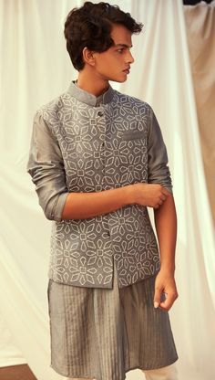 Claudio Bandi is a royal fit for any occasion. A classic grey silk bandi embroidered in motifs inspired by Portugal. Paired with a classic pin tuck kurta in Grey. Composition : Matka Silk Delivery : 5 weeks as the product is hand crafted. Check Size Guide or choose MySize for free customisation (All Sizes above XL can be made at 15% additional cost) For more information and sizes please contact fabiliciousfashion@gmail.com or visit our Copenhagen studio. Indian Wedding Lehenga, London College Of Fashion, Classic Grey, Lehenga Saree, Gray Silk, Wedding Lehenga, Anarkali Suits, Innovative Fashion, Indian Designer Wear