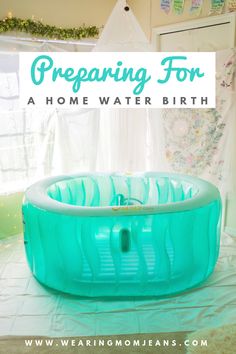 an inflatable pool with the words preparing for a home water birth