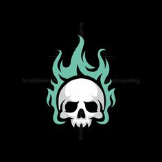 a skull with flames on it's head in the middle of a black background