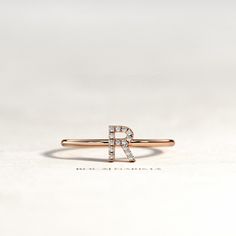 Letter Diamond Ring / Initial Diamond Ring / Personalized Diamond Ring / Personalized Ring / Dainty Initial Ring / Custom Initial Ring ▶ Watch Ring In 360o >> http://bit.ly/BN-202 ☆ Please write the letter you like on checkout ☆ ★ Details : ✔ Ring Width 1.3 mm ✔ Letter Size 5.8 mm ✔ Stones Natural Diamonds ✔ Total Carat Weight... Approx 0.05 Carats ✔ Diamonds Shape Round ✔ Diamonds Clarity SI ✔ Diamonds Color G ✔ Metal 14K / 18K Solid Gold ✔ Gold Color Yellow / White / Rose ✔ Ring US Size Luxury Classic Initial Ring With Diamond Accents, Fine Jewelry Diamond Ring With Initials, Diamond Promise Ring With Initials, Alternative Images, Minimal Wedding Band, Minimal Engagement Ring, Quarter Ring, Ring Initial, Watch Ring