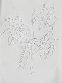 a drawing of some flowers on a piece of paper