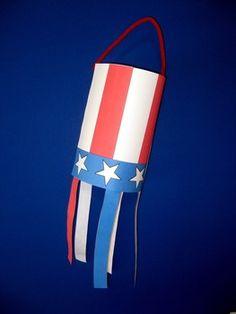 a red, white and blue kite with stars on it