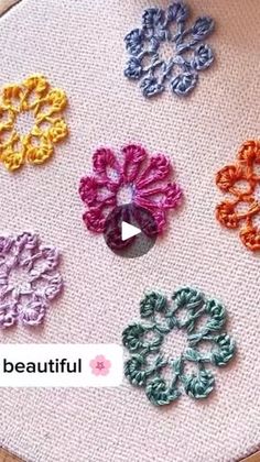 the video shows how to make crochet flower appliques for your project