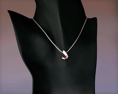 "Mozambique Garnet Necklace - Argentium Silver - 3440 - Argentium Chain Included. A contemporary, yet timeless design by award winning designer, David Worcester. ( IMPORTANT - PLEASE READ 1. AND 2 BELOW ) 1.) Included in the price is an Argentium silver chain appropriate for the pendant chosen. You can choose from 16\", 18\" or 20\" length at checkout. 2.) PLEASE LOOK AT THE MEASUREMENTS CAREFULLY. Some photos have been enlarged to show detail, while others have been minimized to fit the frame. Modern Gemstone Necklace For Anniversary, Modern Garnet Jewelry For Gift, Modern Garnet Jewelry As A Gift, Pendant Necklace With Tension Setting As A Gift, Modern Garnet Jewelry For Anniversary, Modern Ruby Jewelry As A Gift, Modern Garnet Jewelry, Modern Red Ruby Jewelry, Modern Teardrop Pendant Necklaces For Gifts