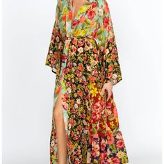 The Burke Kimono Blends An Elegant Shape With Lively Florals. Crafted From Smooth Rayon, This Kimono Showcases A Flowing, Layered Skirt And An Adjustable Belt At The Waist For A Stylish Fit. Layer It Over Jeans And A T-Shirt For A Luxurious Touch To Your Casual Look Or Pair It With A Dress For Your Next Special Event Like New In Excellent Condiion * 100% Rayon * Fabric Covered Snaps * Belt * Tiered Skirt Fitted Multicolor Kimono For Vacation, Multicolor Floral Print Maxi Dress With Kimono Sleeves, Multicolor Kimono With Kimono Sleeves For Brunch, Vibrant Spring Dress With Kimono Sleeves, Spring Multicolor Maxi Dress With Kimono Sleeves, Multicolor Maxi Dress With Kimono Sleeves For Spring, V-neck Kimono With Floral Print For Brunch, Multicolor V-neck Kimono For Daywear, Floral Print V-neck Kimono For Beach