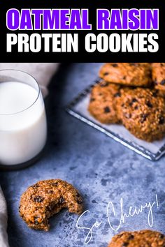 oatmeal raisin protein cookies on a baking sheet next to a glass of milk