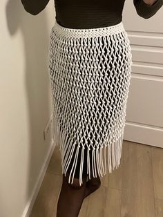 Handmade Macrame Skirt - a festival essential and a perfect choice for Engagement party, birthday parties, or even a distinctive wedding day outfit. This white boho-style skirt adds a touch of flair to your celebration looks. Information: * Material: polyester cord. * Color: white - ready to ship.  * Size: s-m * Handmade by myself in Lithuania, Europe. * Size s-m in white is ready to ship. For other sizes or other colors - please contact me by messages here on Etsy.  Care recommendations: hand-w Summer Festival Fringe Skirt, Traditional Maxi Skirt For Spring Beach Outings, Beach Long Skirt With Tassels, Long Beach Skirt With Tassels, Long Tassel Skirt For Summer, Summer Skirt With Tassels, Traditional Beach Skirt For Summer, Traditional Summer Skirt For Vacation, Traditional Beach Fitted Skirt