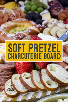 there is a sign that says soft pretzel charcuterie board