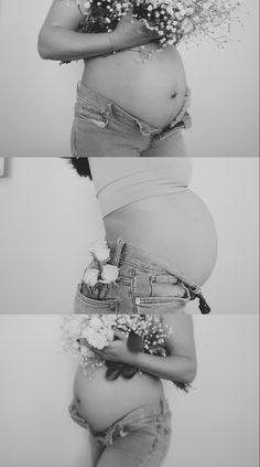 the pregnant woman is holding flowers in her belly