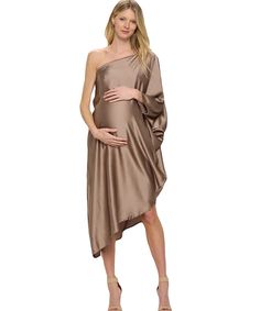 This absolutely stunning oversized asymmetrical one-shoulder dress is perfect for moms-to-be at all stages of pregnancy; including postpartum! Turn heads in this classy yet cool-mom fit this season at special events and holiday parties! Color: Satin Cocoa, Red 97% Polyester, 3% Spandex Sizes: XS/S (0-4), M/L (6-10), L/XL (12-18) Questions? Use the chat icon to connect with a stylist! Stages Of Pregnancy, Chat Icon, White Maternity Dresses, Work Skirts, Pregnancy Stages, Casual Evening, Nursing Tops, Maternity Swimwear, Nursing Dress