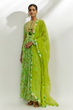 Lime green anarkali featuring floral print all over with mirror and gota detailing in the front. Paired with a straight pant and organza dupatta. - Aza Fashions Transitional Green Anarkali Palazzo Set, Unstitched Green Anarkali Palazzo Set, Green Anarkali Palazzo Set For Festivals, Green Anarkali Palazzo Set With Zari Work, Green Unstitched Anarkali Set For Transitional Season, Diwali Green Anarkali Palazzo Set, Pista Green Chikankari Embroidered Cotton Silk Anarkali Set, Designer Anarkali Palazzo Set In Green, Green Anarkali Lawn Suit With Traditional Drape