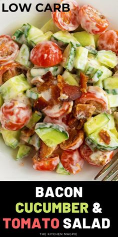 bacon, cucumber and tomato salad on a white plate with a fork in it