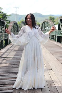 All items are shipped to Thailand Post. Free upgrade to D.H.L Express when you but 2 or more. The USA only. Made from 100% natural cotton. Color is a slightly off-white creamy color. This beautiful full maxi dress and half lined in the same material. V-neck neckline made in lace and back with solid material Three quarter length sleeves in machine lace finished with a double layered cuff The second last tier is made of machined lace brings the dress together from top to bottom Empire waist adding Bohemian Long Sleeve Lace Maxi Dress, White Flowy Bohemian Boho Dress, Bohemian Off White Maxi Dress, White Bohemian Lace Maxi Dress, Flowy White Boho Dress For Wedding, White Flowy Lace Boho Dress, White Lace Bohemian Maxi Dress, White Lace Flowy Boho Dress, White Bohemian Boho Wedding Dress