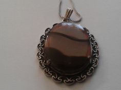 "These came in together, but adjustable chain is probably very recent and the pendant is likely 60s or 70s. Glass agates are frequently used in \"Scottish Pebble\" jewelry, much of it made in Birmingham, but this is completely unmarked and not overtly Celtic. \"Agate\" is a light brownish gray streaked with black. Good vintage condition. Chain adjusts from roughly 16\" to 18\". B11" Gray Streaks, Pebble Jewelry, Banded Agate, Heart Locket, Agate Pendant, Box Chain, Birmingham, Antique Gold, Locket