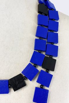 Description: Klimt Collection Necklace 2 x 2 cm cobalt blue/black square as colour block Length: Approximately 140 cm Colours: Cobalt Blue, Black Product code: NL2033-3501 Blue Square Necklace For Gifts, Blue Square Necklace For Gift, Blue Square Necklace Perfect For Gifts, Modern Blue Rectangular Necklace, Handmade Blue Rectangular Necklace, Modern Blue Rectangular Jewelry, Square Necklace, Black Square, Colour Block