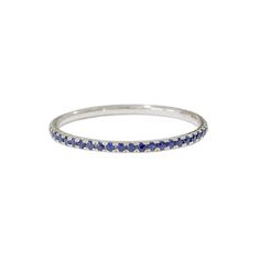 "This finely handcrafted ring is made completely of 14K solid gold and micro pavé set with genuine AAA quality round brilliant cut natural real Blue Sapphire gemstones. Perfect for stacking. ♦ Band Width: approximately 1.3mm ♦ Metal Finish: High Shine Polish ♦ This design is available in Rose, White and Yellow 14K Gold; also in 14K White Gold with Black Rhodium Plated Finish ♦ This item is proudly made in USA. *This piece comes in a Nana Bijou branded white leatherette jewelry gift box, along wi Sterling Silver Sapphire Ring With Pave Setting, Sapphire Ring With Pave Setting, Sapphire Rings With Pave Setting As Gift, Yellow Gold Sapphire Round Eternity Band, Round Sapphire Ring With Pave Setting, Classic Sapphire Rings With Pave Setting, Sapphire Eternity Band With Vvs Clarity, Fine Jewelry Sapphire Eternity Band, Round Sapphire Ring With Pave Setting Gift