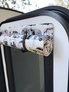 a close up of a door handle on a bus