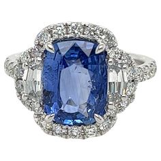 CDC certified cushion Ceylon Sapphire weighing 3.08 carats Measuring (10.78x8.11x3.96) mm 32 round diamonds weighing .66 carats 2 Cadillac diamonds weighing .41 carats E-VVS Set in 18k white gold ring 5.01 g Ceylon Sapphire, Sapphire And Diamond Ring, Sapphire Diamond Ring, I Love Jewelry, Shiny Things, Love Jewelry, White Gold Ring, Sapphire Diamond, Jewelry Rings Engagement