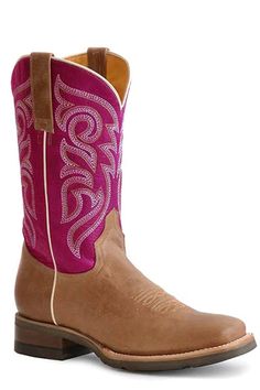 Check out this great looking pair of boots by Roper! This is a great riding/barn boot or just a nice everyday square toe boot for rocking with your favorite jeans. Square Toe Burnish Tan Leather Vamp Embroidered Pink Leather 11" Shaft Double ¾ Welt Sole With Nails Walking Heel Rest Removeable Insole All Leather Lining Handcrafted Boot GEO Outsole 11” Shaft Height 15" Circumference of calf Measurements for this boot were taken from a size 8. Please note that measurements may vary by size. Western Mid-calf Boots With Square Toe And Reinforced Heel, Country Style Fitted Boots With Square Toe, Western Riding Boots For Fall, Western Fitted Mid-calf Boots With Square Toe, Country Style Fitted Square Toe Boots, Pink Western Boots With Snip Toe, Pink Western Snip Toe Boots, Western Brown Mid-calf Boots With Square Toe, Country Style Boots With Square Toe For Western-themed Events