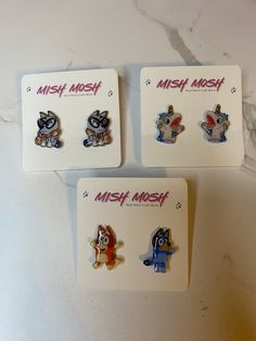 Bluey, Bingo, Unicorse, and Muffin Earrings.  These earrings, available is stud piercing or clip on, are made from shrinky dinks and epoxy resin. Show love for everyone's favorite show with a set of Bluey and Bingo, set of Bingo, set of Bluey, set of Unicorse, or set of Muffin. Note: if you get all three sets it will include the Bluey and Bingo combo, Unicorse, and Muffin. Themed Blue Earrings For Gifts, Themed Blue Earrings For Gift, Blue Themed Earrings For Gift, Blue Kawaii Earrings For Gift, Blue Quirky Earrings As Gift, Quirky Blue Earrings For Gift, Quirky Blue Jewelry For Gifts, Quirky Blue Jewelry For Gift, Cute Blue Jewelry For Birthday Gift